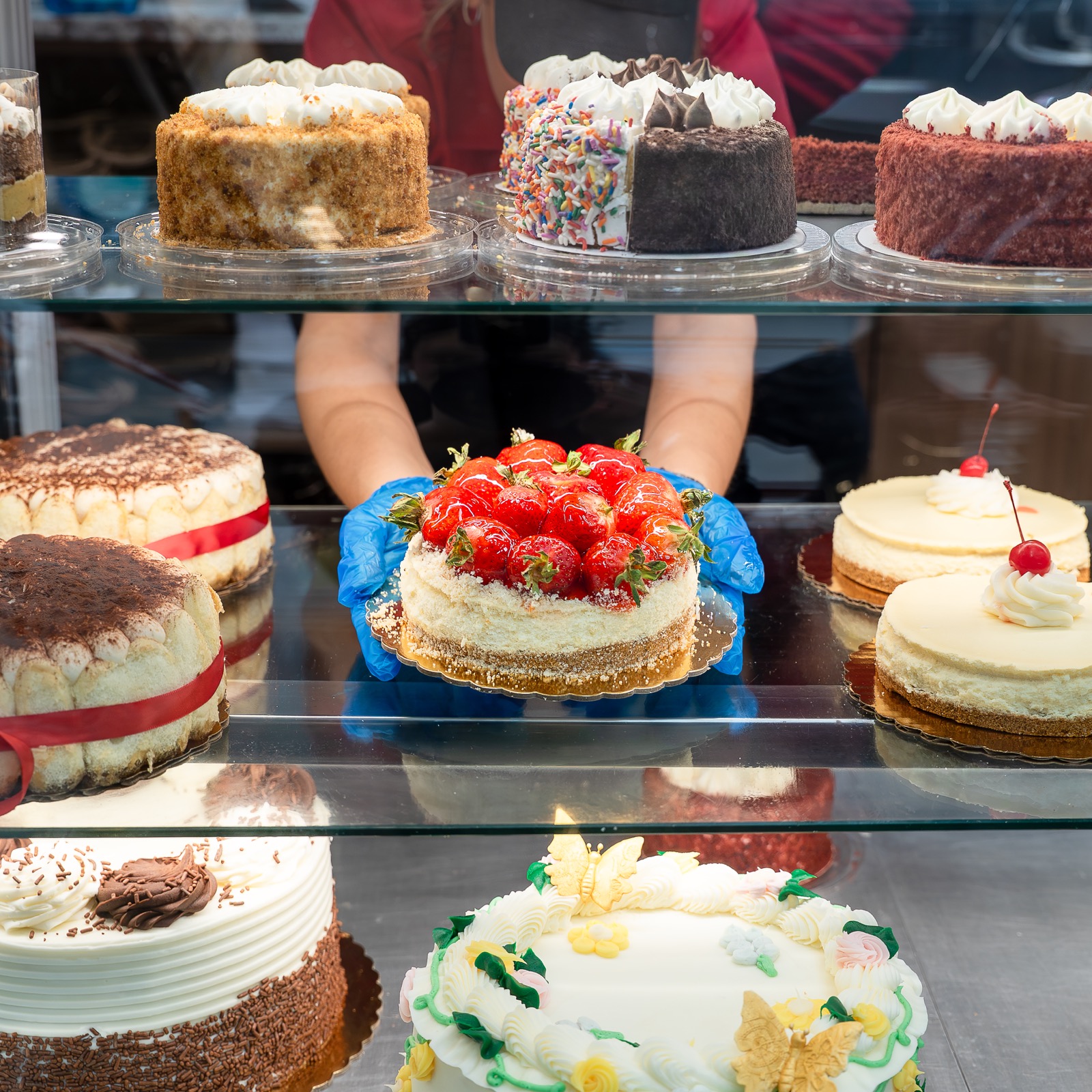 Carlo's Bakery cake case with fresh desserts
